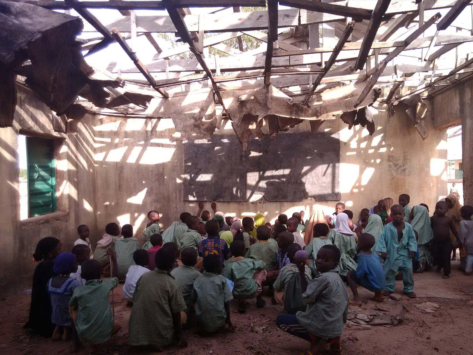 Students at a damaged Niger State school